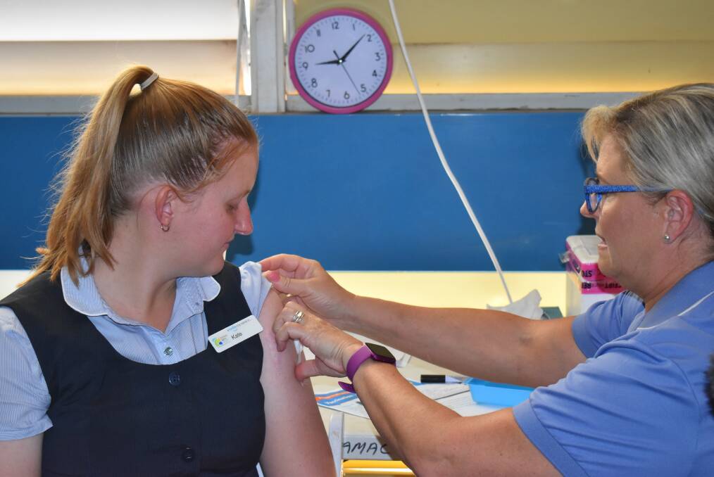 New nurse graduate Kate Whelan from Barcaldine Multipurpose Health Service accompanied the Central West Health COVID-19 vaccination team to Aramac on Monday and was vaccinated by nurse immuniser Jennifer Mathiesen.