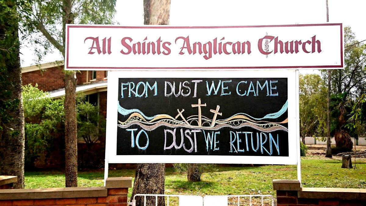 Praise be: Taking a leaf out of Murweh mayor Annie Liston's book of positivity, this sign appeared outside a church in Charleville soon after last week's dust storm. Picture: Sally Cripps.