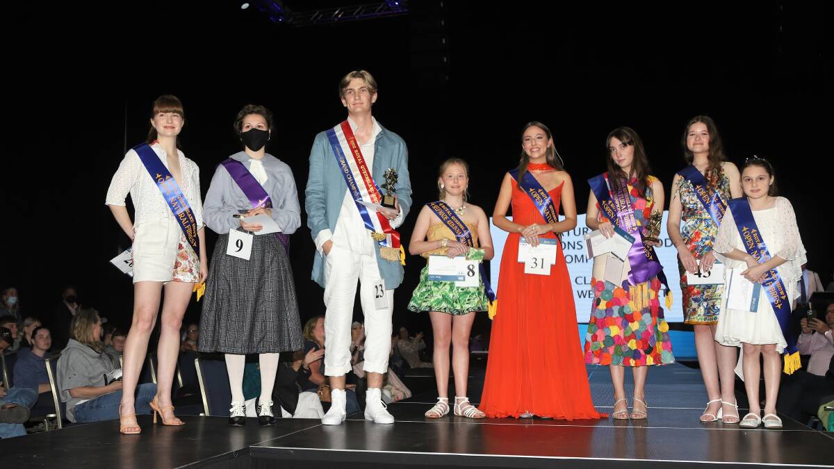 The Natural Fibres winning line-up, including the grand champion outfit and its designer, Tayla McFarlane, dressed in orange. Pictures: Sally Gall