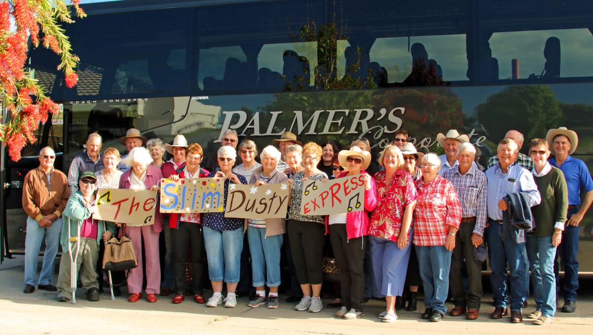 Slim Dusty fans from the Maranoa ready to board their bus.