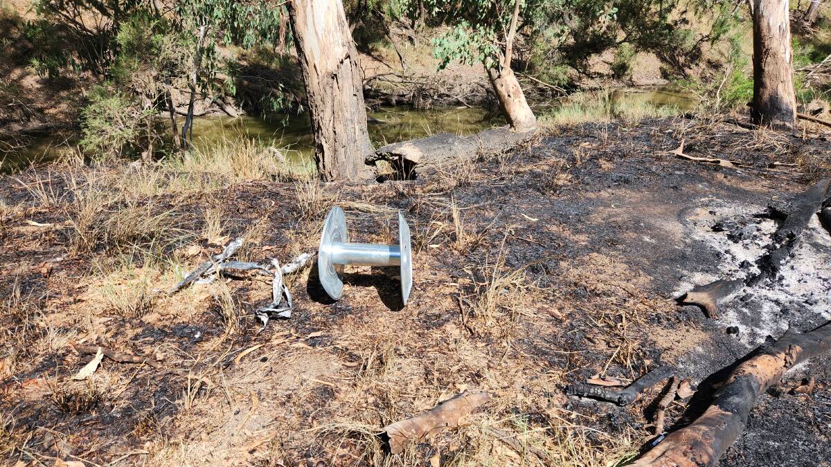 A reel abandoned beside a fire on a reserve in the Roma district. Picture: Sally Gall
