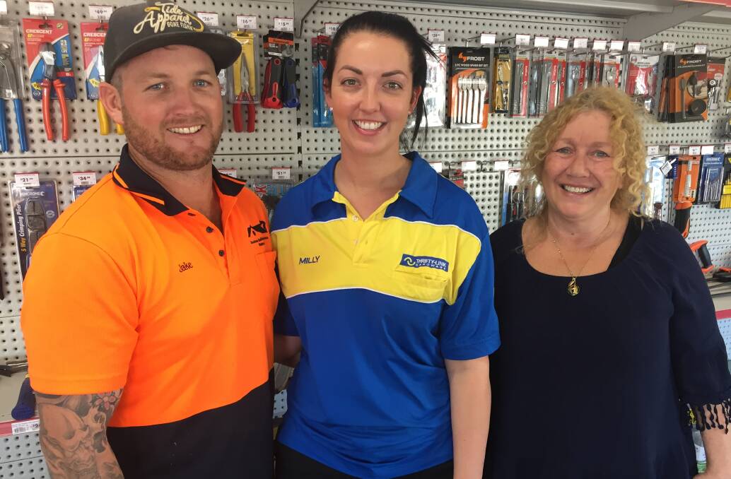 Jake Stockham and Milly South from Winton Hardware, one of the LiveVoucher registered businesses, with Jodie Gadd, family support coordinator for the Winton Shire Council.