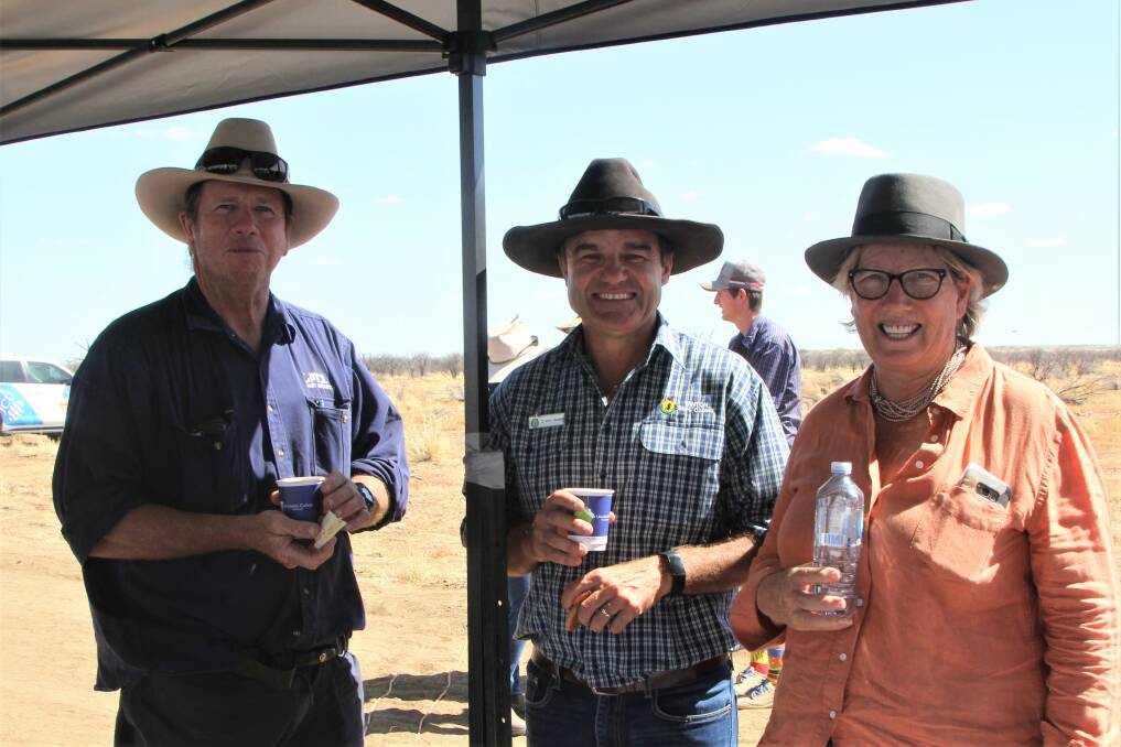 Brett Elliott told Winton Shire Council Mayor Gavin Baskett and councillor Anne Seymour that its coordinated wild dog control was a win for his sheep operation.