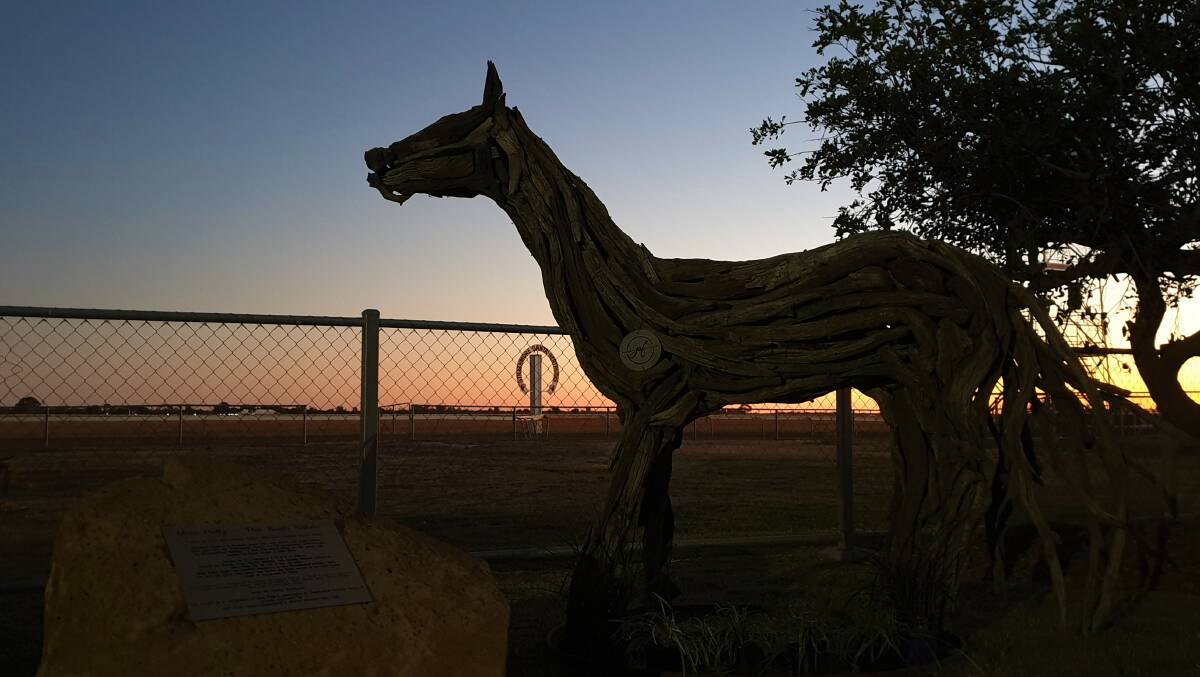 The sculpture stands proudly at the entrance to the Blackall racecourse.