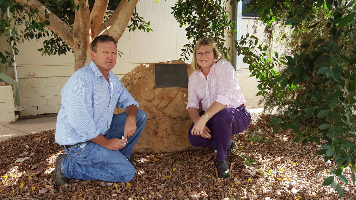 WME managing director Campbell McPhee and Warrego MP Ann Leahy check out the foundation stone laid to commemorate the abattoir's opening, during the Borbidge-Sheldon government in 1996.