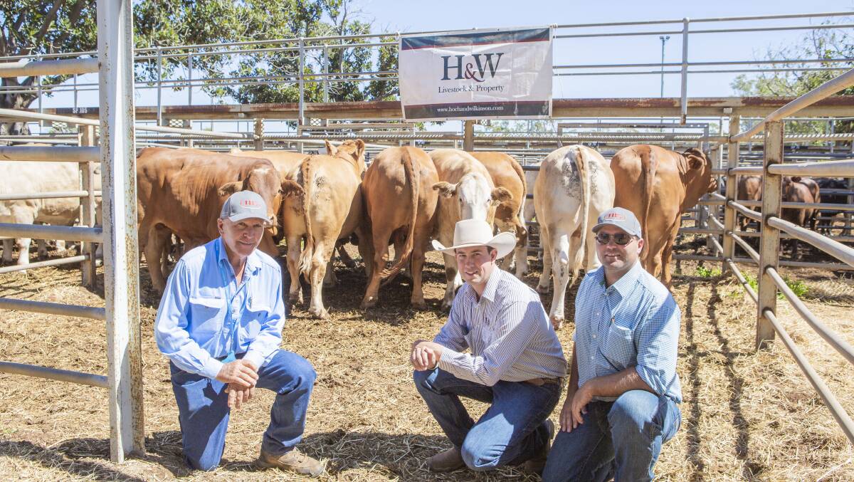 Hoch & Wilkinson's Jake Passfield, centre with Clermont Beef Expo grand champion pen winners, Frank Finger and Scott Finger Hillview Cattle Co. Pictures: Alisha Hoch