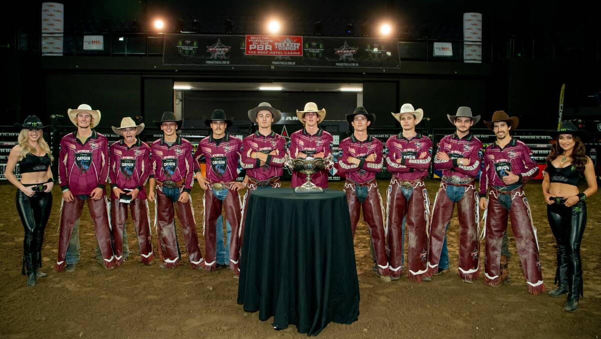 Team Queensland, led by Clermont's Aaron Kleier, with the PBR State of Origin trophy following its success in the second round held at Cairns on the weekend.