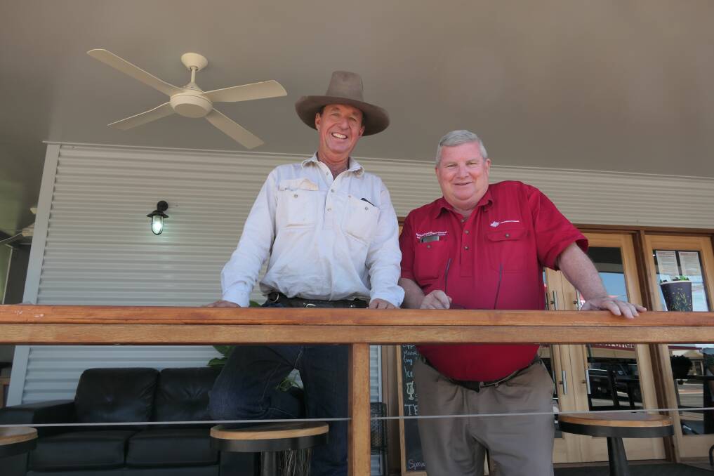 Monsoon-affected beef producer Scott Harrington with National Drought and North Queensland Flood Response and Recovery Agency Coordinator-General Shane Stone in Julia Creek during the fact-finding tour. Pictures supplied.