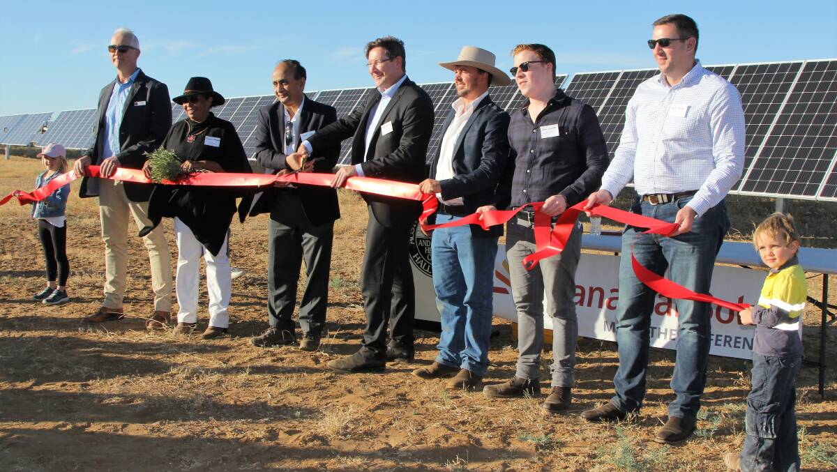 Cutting the symbolic red ribbon at the opening were Longreach Regional councillor, Tony Martin, Aboriginal elder, Suzanne Thompson, Canadian Solar's energy group vice president of operations, Steven Iyer, the Member for Bancroft, Chris Whiting, property owner, James Walker, project manage, Josh Currah, and Chris Eccles, RCR, the construction contractor. Photos - Sally Cripps.