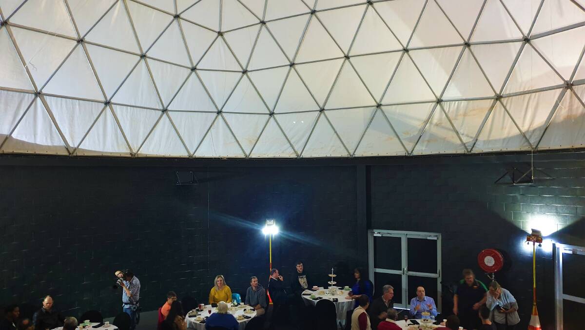 High tea with visiting scientists was held beneath the unfinished dome.