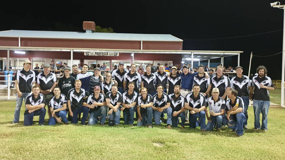 Proud Blackall Magpies team members last Saturday following the announcement to their home crowd that they were the top sporting club in the country.