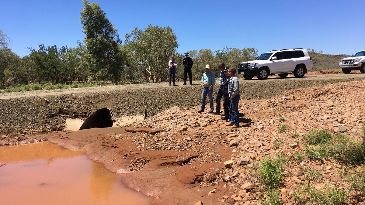 Cloncurry mayor, Greg Campbell, the Minister for Emergency Services, Craig
Crawford, and McKinlay Shire Council's deputy mayor, Neil Walker, inspected the Butcher Creek crossing on the Corella Park Road north west of Cloncurry.