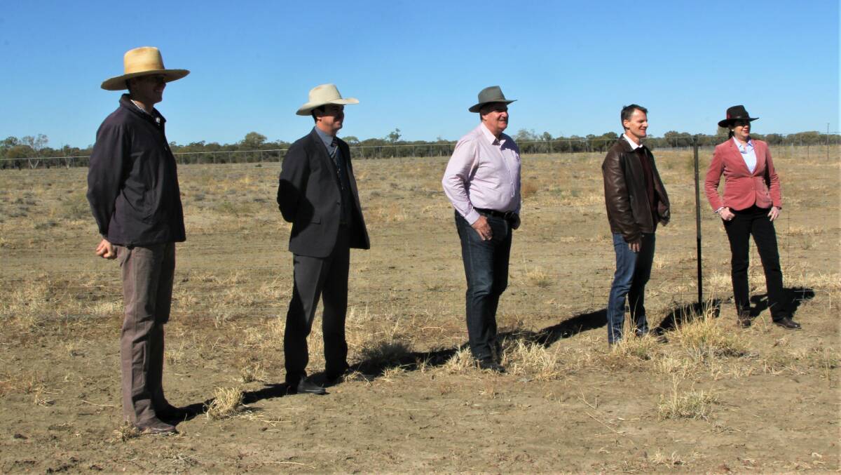 United we stand: Barcaldine grazier David Counsell, Barcaldine Regional Council mayor Sean Dillon, Agriculture Minister Mark Furner, RAPAD project officer Morgan Gronold, and Premier Annastacia Palaszczuk inspecting one of the existing cluster fence projects at Barcaldine. Picture: Sally Gall.