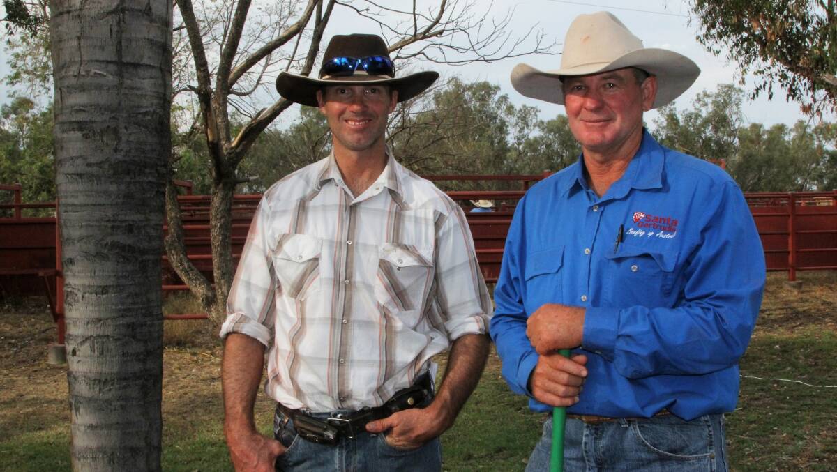 Craig Moller, Recruit, Clermont, talks over his purchase of five bulls with Eyriewald stud manager, Mark Bradshaw.