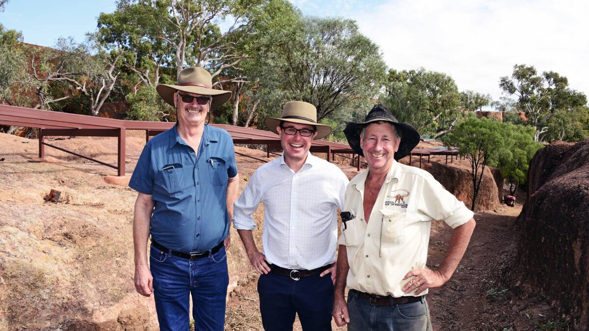Butch Lenton, left, at the Australian Age of Dinosaurs with the Member for Maranoa, David Littleproud, and AAOD founder, David Elliott.