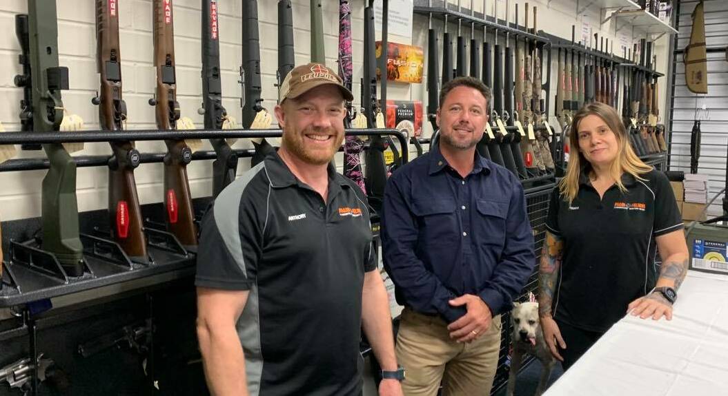 Hinchinbrook MP Nick Dametto with the owners of Pagan Firearms, Anthony and Tanya Pagan, earlier this year before COVID-19 restrictions were in place. Picture supplied.