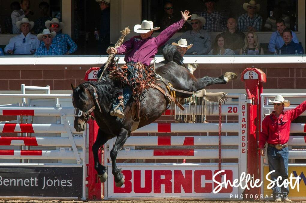 Injune's Damian Brennan competing at the Calgary Stampede in the saddle bronc event. Picture supplied.