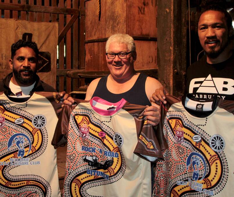 Snakes alive: Preston Campbell and David Kerrigan showed off the jerseys designed for the Bedourie 9s competition. Pictures: Sally Cripps.