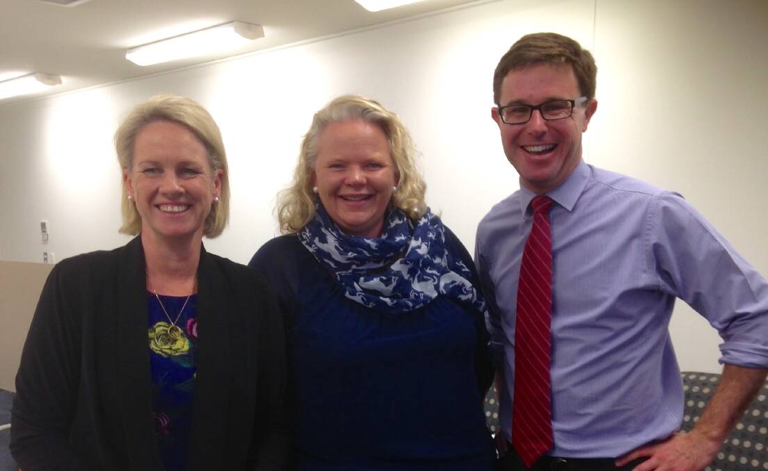 Strong signals: Alpha's Kristy Sparrow, centre, had the ear of Regional Communications Minister Fiona Nash and Member for Maranoa, David Littleproud in Longreach last week. Photo: contributed.