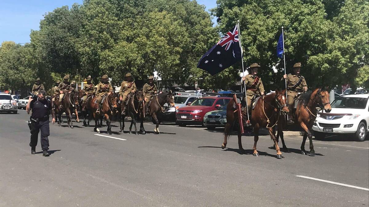 The Light Horse troop marching along Heroes Avenue in Roma. Pictures supplied.
