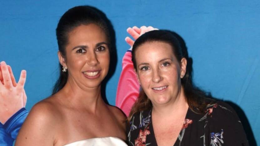 Danielle Taylor at the Swim Australia awards night with Australia Swim Coaches and Teachers Association board member Emma Lawrence, the daughter of Laurie Lawrence. Picture - ASCTA.