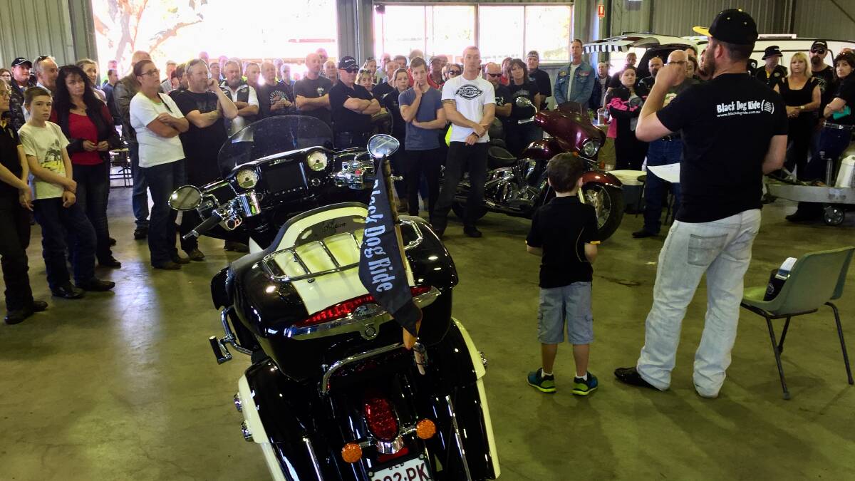Darling Downs Riders president, Clay Cahill, giving motorcyclists a pre-ride briefing in Toowoomba on Sunday morning.