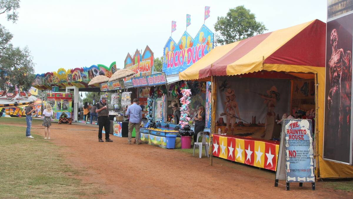 Charleville's sideshow alley was impacted by rainy weather that was keeping patrons away.