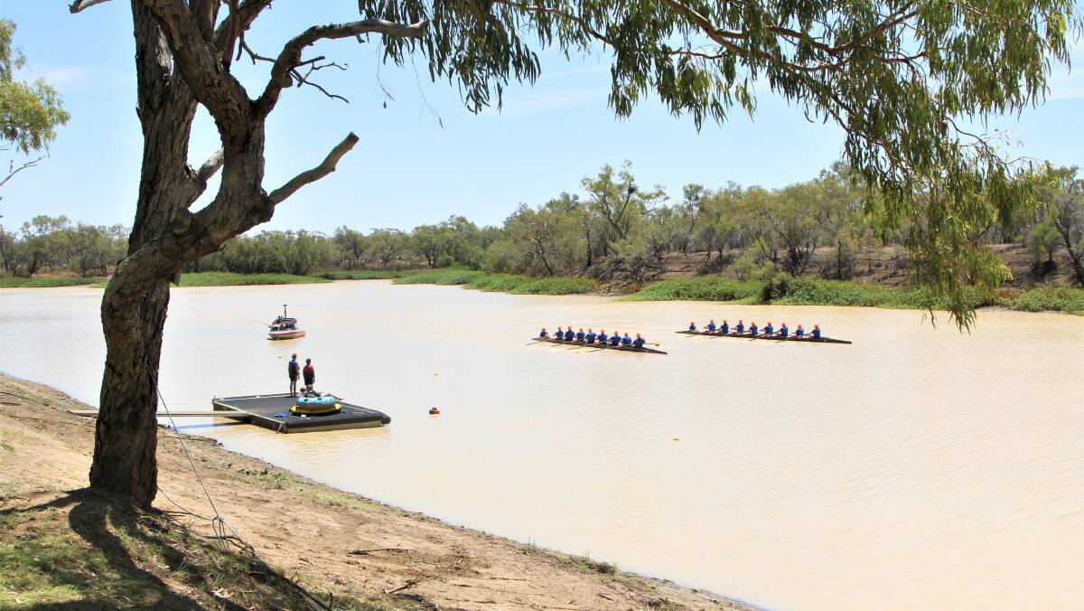 The two Vikings crews rowing in unison along the Thomson River outside Longreach on Sunday. Pictures: Sally Gall
