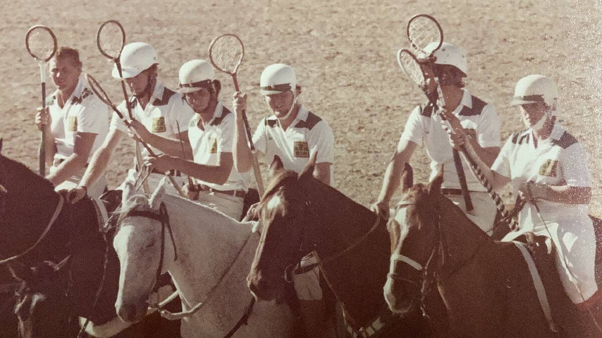 Ivan Oliver, far left, lining up with the Blackall I polocrosse team for a grand parade.