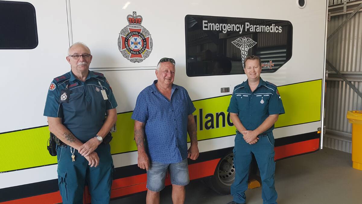 Snake bite survivor Keith Jackson, centre, reunited with the Longreach paramedics who came to his aid, Frank Smith and Ryan Parish. Picture supplied.