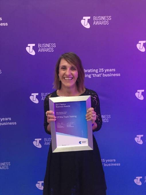 Off the Track Training principal, Joy McClymont with her finalist award, presented at the state awards gala dinner.