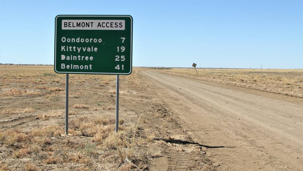 The Belmont access road passes through Oondooroo, where the pasture has largely failed to grow.