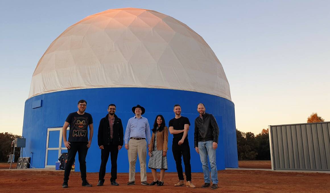 Scientists from along Australia's east coast - Jake Clark, USQ, Toowoomba; Sadegh Imani and Erik Streed, Griffith University, Brisbane; Jyotsna Batra, QUT, Brisbane; Nathaniel Butterworth, University of Sydney, NSW, and Duane Hamacher, Melbourne University, Vic - had crowds enthralled all weekend at the Cosmos Centre. Pictures - Sally Cripps.
