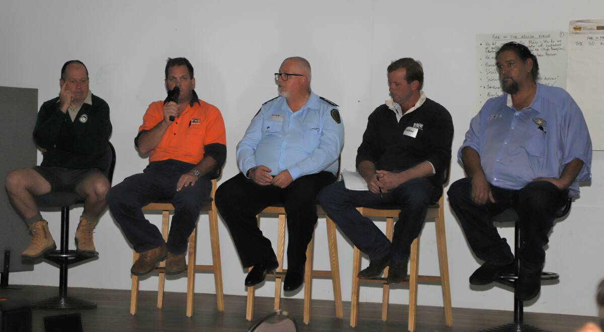 A panel representing various organisations discussed best ways of fire management.