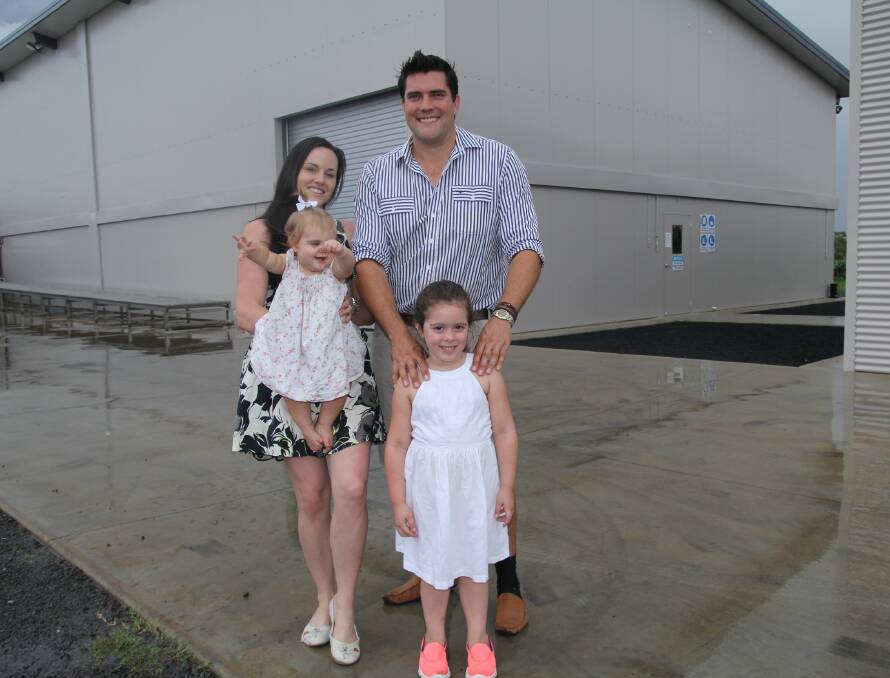 Krista Watkins, husband Rob and their daughters Kira and Kate, pictured outside their Natural Evolution factory at Walkamin on the Atherton Tablelands. Photo - Lea Coglan.