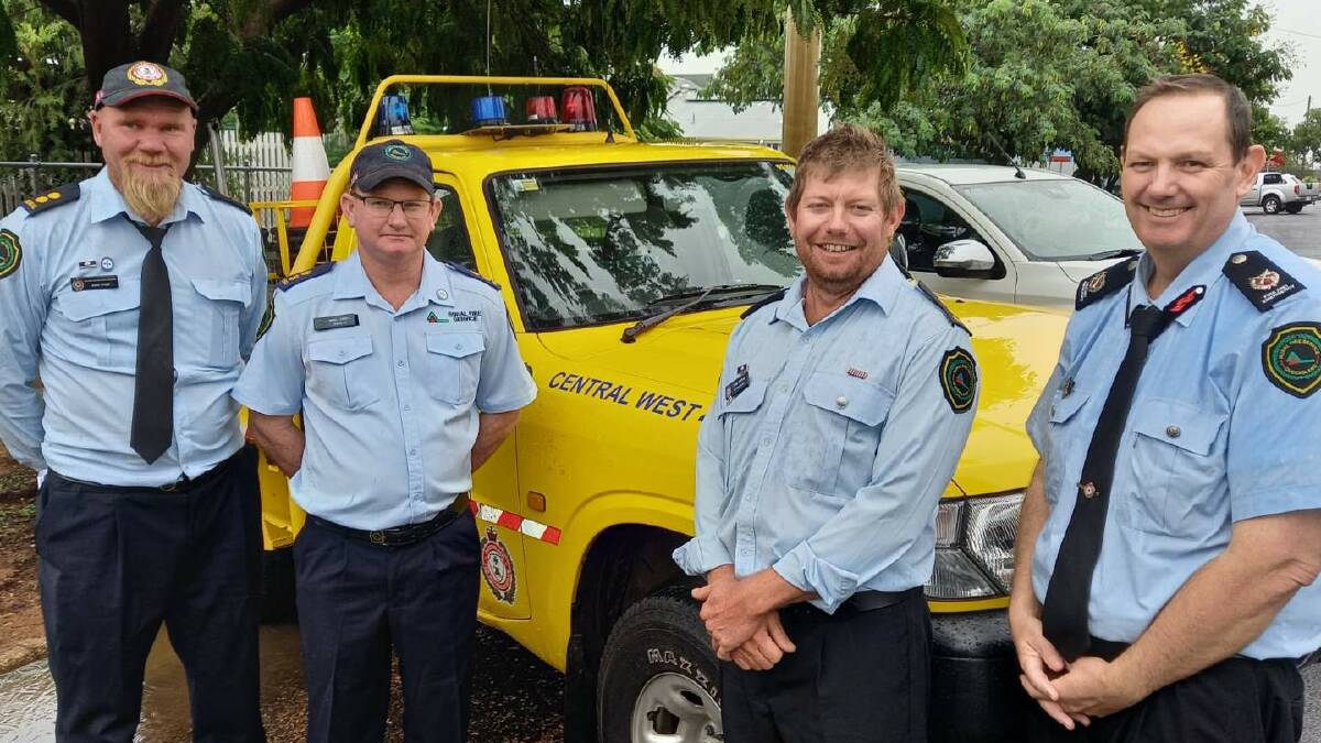 Mark Tysoe, Ilfracombe, Mik Leaney, Jericho, and Tyrel Spence, Muttaburra with Rural Fire Services assistant commissioner Tony Johnstone at the handover of a light attack vehicle for the brigades. Picture: Justin Choveaux