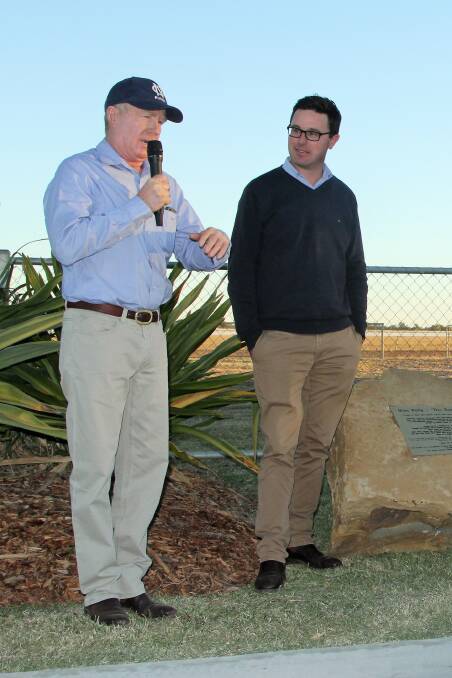 Barcoo Amateur Race Club president Paul Banks retells the story of Miss Petty, with Maranoa MP David Littleproud watching on.