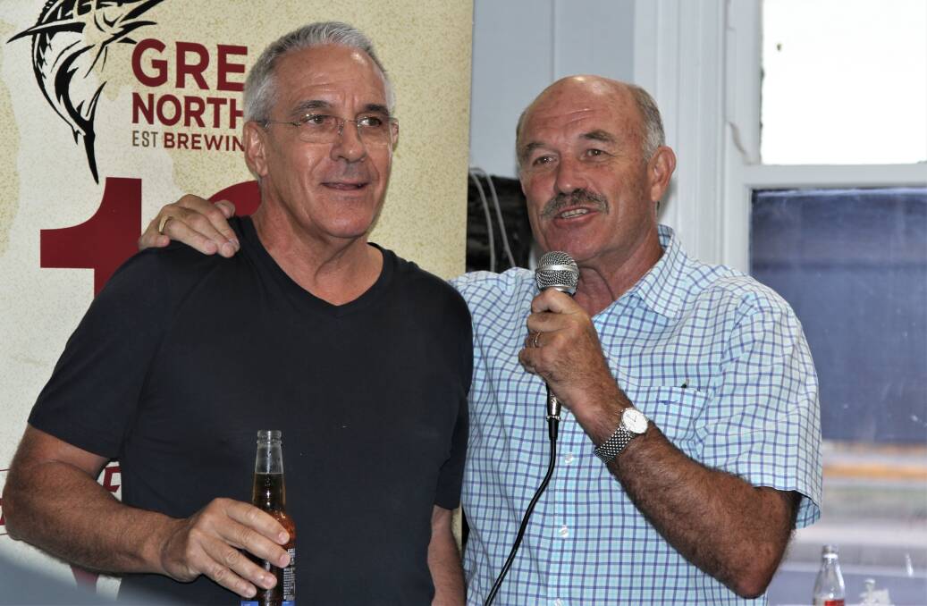 Media mates Steve Haddan and Wally Lewis trading stories for the crowd attending the function in Roma.