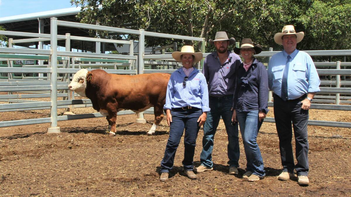Equal top priced bull Meldon Park Q33, vendor Lis Skene, purchasers BJ and Alison Woods, Aramac, and GDL stud stock representative Peter Brazier.