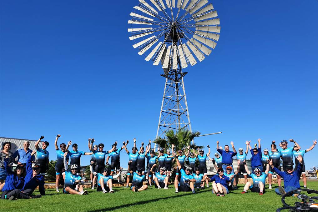 The RideWest team and support crew preparing to set off from Pumps N Solar at Roma for day four of the 1240km journey. Picture: Sally Gall