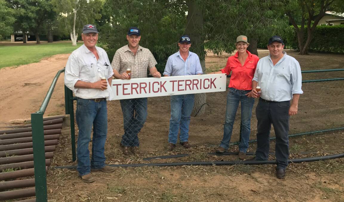 James Pearson, left, and Sarah Pearson, second right, with AAM general manager north Ben Wratten, AAM CEO Tim Gallagher, and AAM managing director Garry Edwards toasting the sale of Terrick Terrick at the homestead south of Blackall.