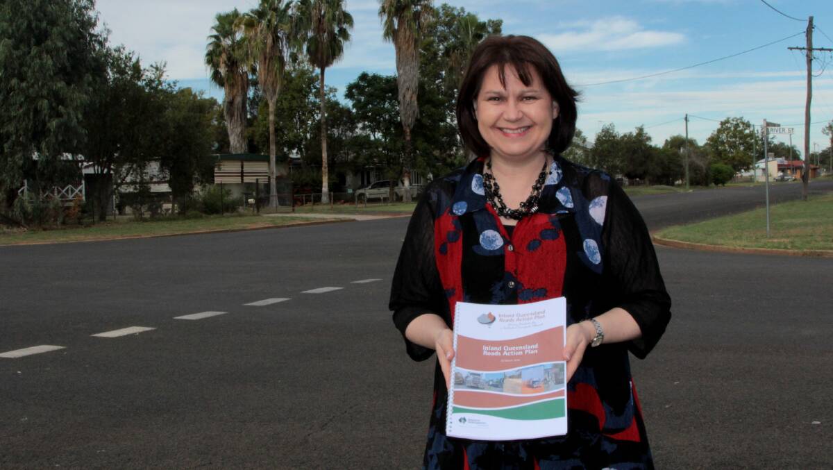 Powerful argument: Inland Queensland Roads Action Plan representative Glenys Schuntner with the funding strategy they want adopted. Picture: Sally Cripps.