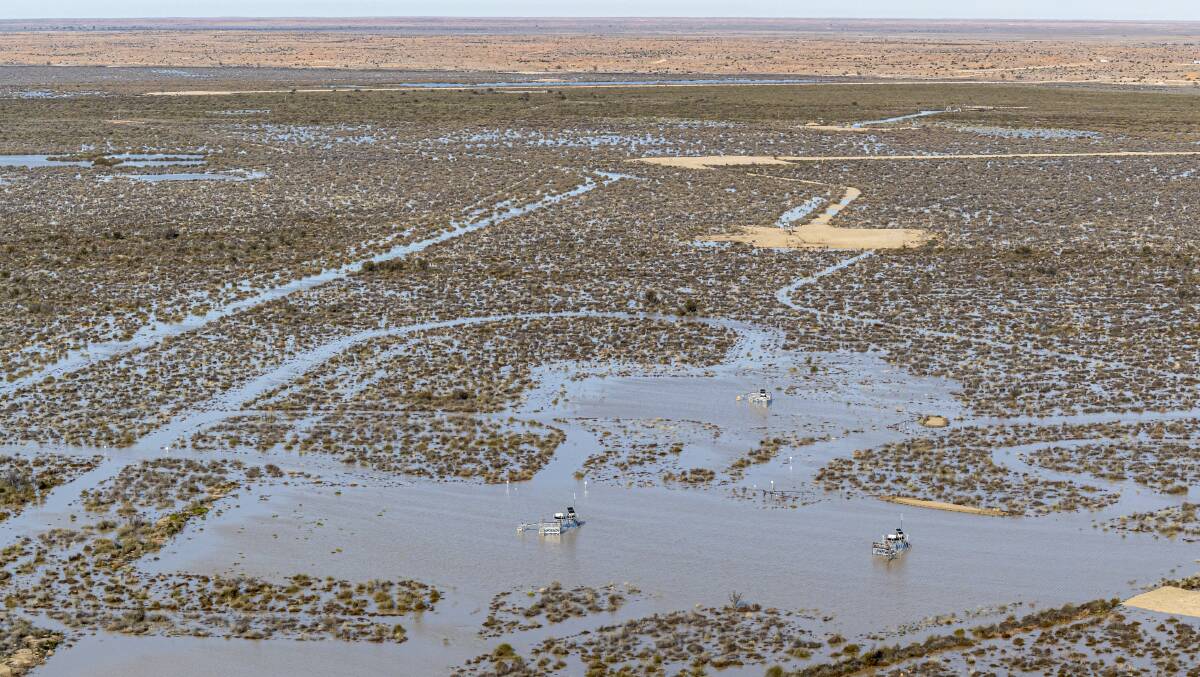 An aerial photograph showing the impact of the Cooper Creek flood on gas development in the Tirrawarra Swamp, in the Coongie Lakes wetland in northern South Australia. Picture: Doug Gimesy
