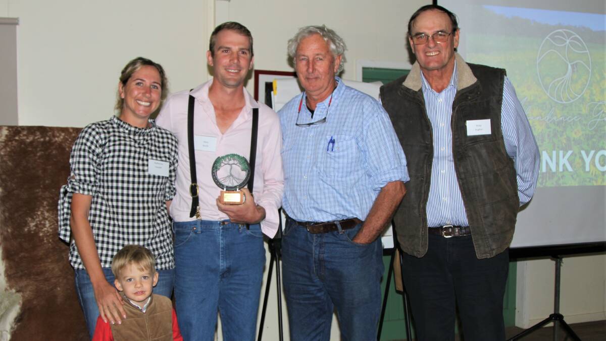 Kat Fausett and Beau North accepting their Lachlan Hughes Foundation scholarship memento from Charlie Massy and Philip Hughes, with Hamish Hughes joining in. Picture: Sally Gall