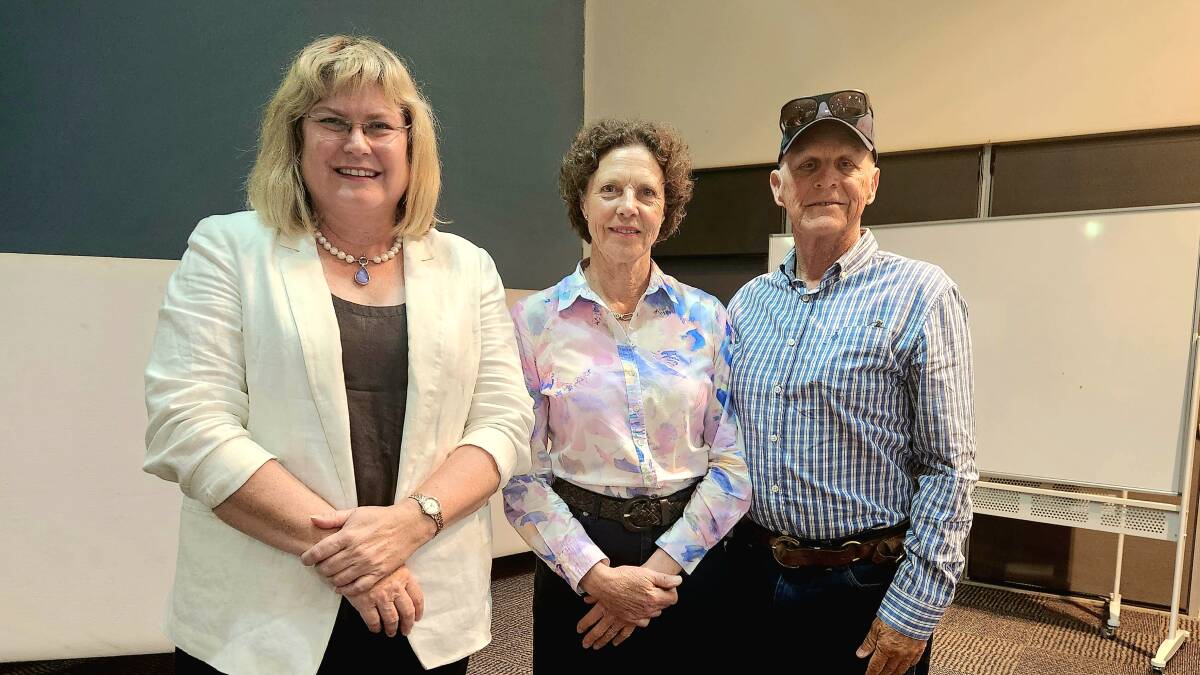 Warrego MP Ann Leahy, who had been going through the Auditor-General's report to parliament on renewable energy, with Anna and Edward Bassett, who helped initiate the forum. Picture: Sally Gall