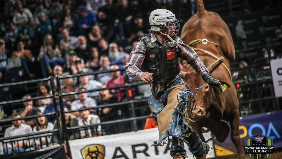 Wyatt Milgate evading a bull at Cairns on the weekend. Picture: PBR Australia