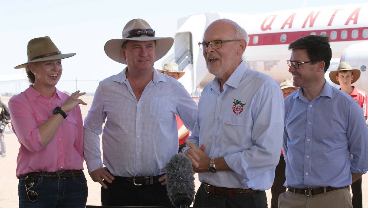 Happy day: Qantas Founders Museum chairman, John Vincent, flanked by the LNP's deputy leader, Bridget McKenzie, leader and deputy Prime Minister, Barnaby Joyce, and the Member for Maranoa, David Littleproud, at the announcement. Photo supplied.