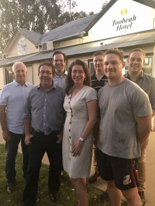 Senator Susan McDonald (centre), pictured with fellow Senators James McGrath and Matt Canavan plus locals from Toobeah and Goondiwindi at the Toobeah Hotel prior to social distancing restrictions, has added her voice to those opposing the weekend fines handed out to country pubs. Picture supplied.