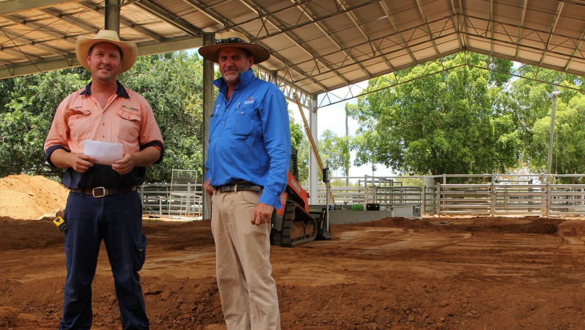 Schedule: Aaron Purse, PF Instal Solutions, discusses the work timetable with Blackall saleyards manager, Dave Carter. Pictures: Sally Cripps.