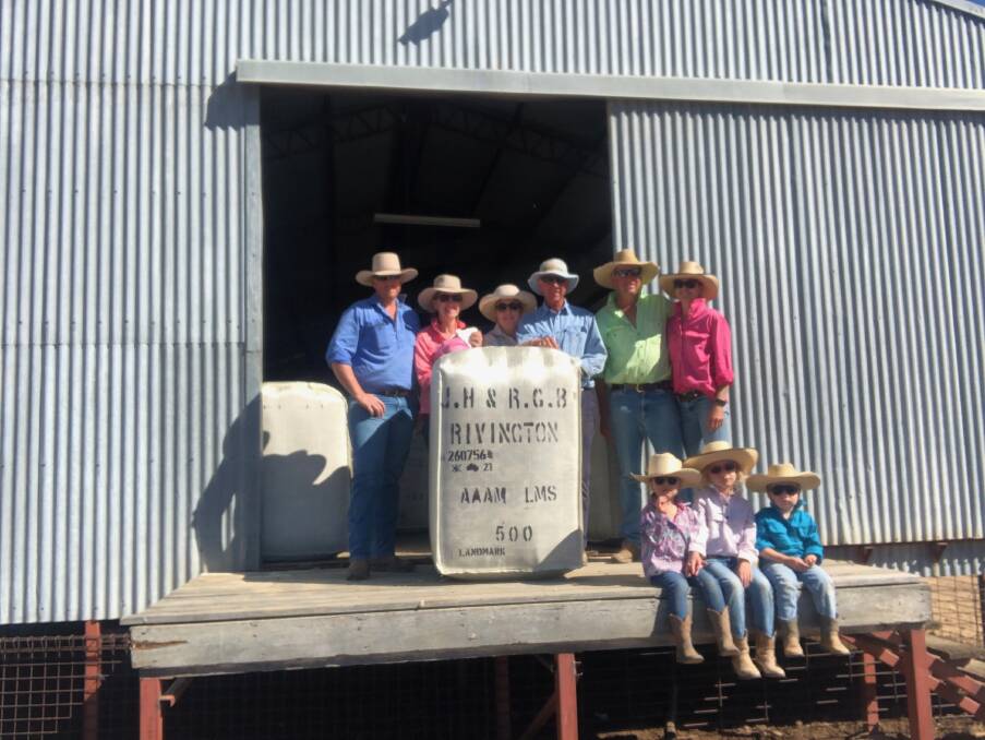 Three generations of the Banks family with the five hundredth bale produced this season from their country west of Blackall. Picture supplied.